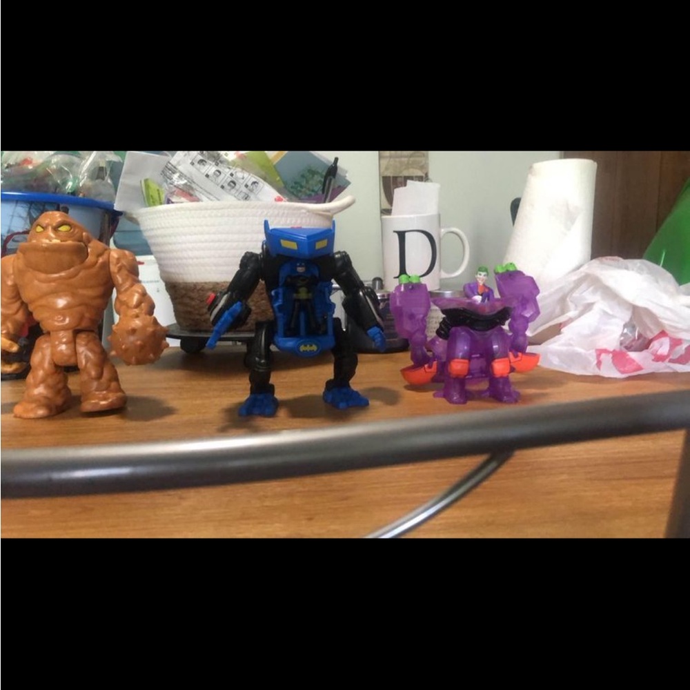 Clay face Batman mech joker mech